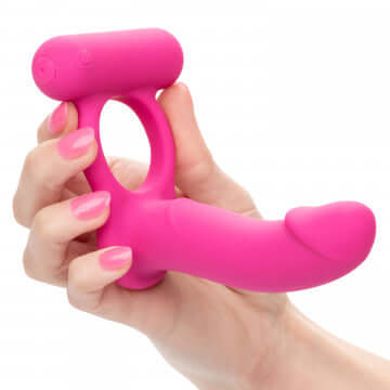 Silicone Rechargeable Double Diver held in a hand showcasing its pink color and ergonomic design.